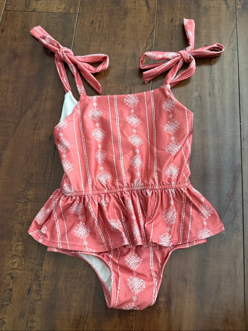 Well Dressed Wolf Coral Pink Peplum One-Piece Suit with Tie Straps (Wildling)